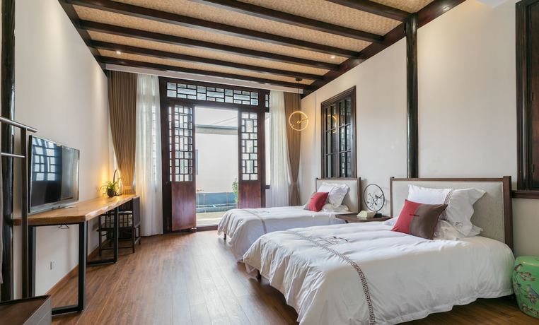Imagen de la habitación del Hotel Yi Garden Cultural Disney Branch. Foto 15