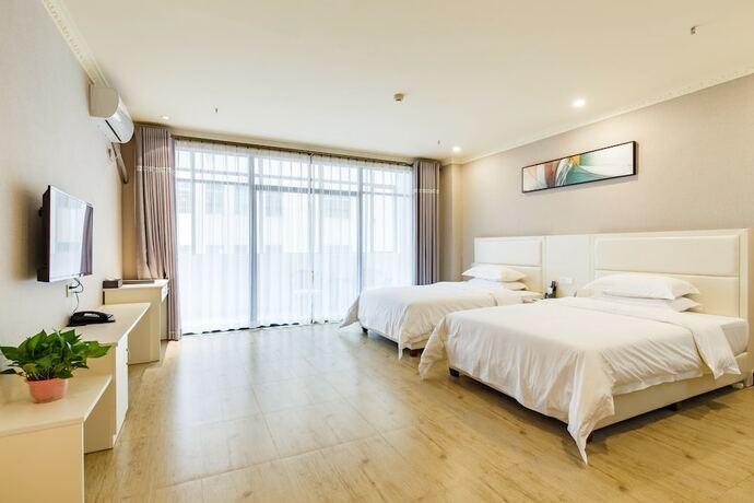 Imagen de la habitación del Hotel Yi Hao International Apartment. Foto 22