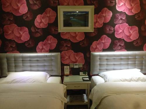 Imagen de la habitación del Hotel Yi Jia City. Foto 2