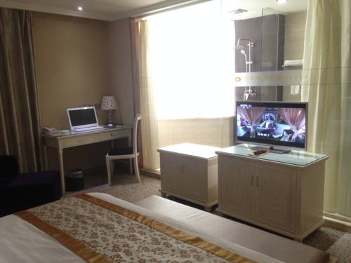 Imagen de la habitación del Hotel Yi Jia City. Foto 4