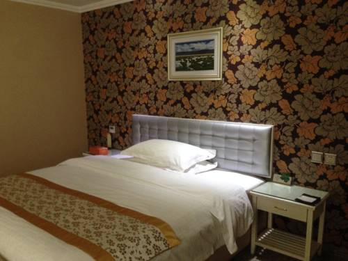 Imagen de la habitación del Hotel Yi Jia City. Foto 5