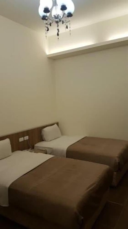 Imagen de la habitación del Hotel Yi Jia Fu Yuan. Foto 4