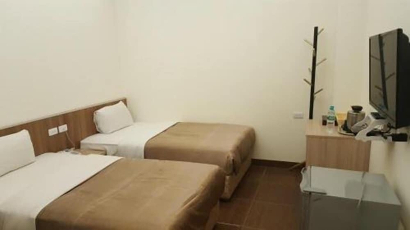 Imagen de la habitación del Hotel Yi Jia Fu Yuan. Foto 5