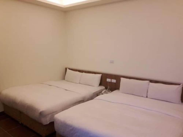 Imagen de la habitación del Hotel Yi Jia Fu Yuan. Foto 6