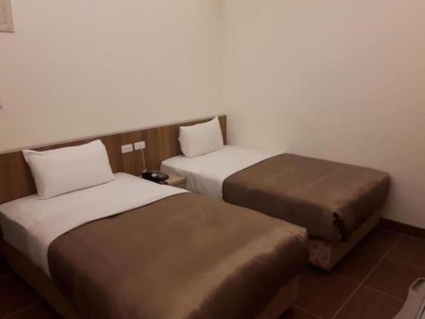 Imagen de la habitación del Hotel Yi Jia Fu Yuan. Foto 8