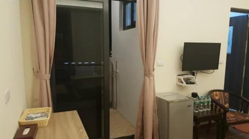 Imagen de la habitación del Hotel Yi Jia Fu Yuan. Foto 13