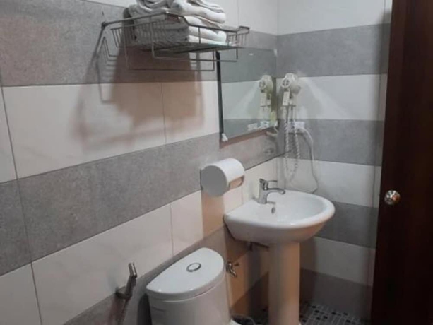 Imagen de la habitación del Hotel Yi Jia Fu Yuan. Foto 14