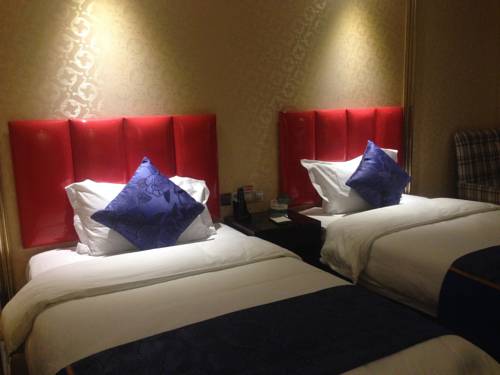 Imagen de la habitación del Hotel Yi Jia Ming Ren. Foto 3