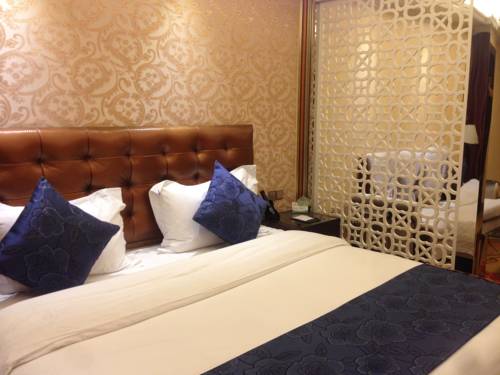 Imagen de la habitación del Hotel Yi Jia Ming Ren. Foto 5