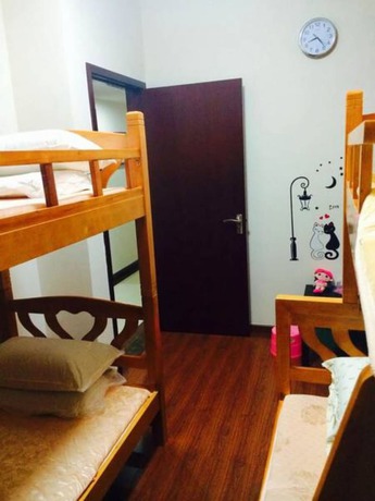 Imagen de la habitación del Hotel Yi Jia Ren Hostel. Foto 2