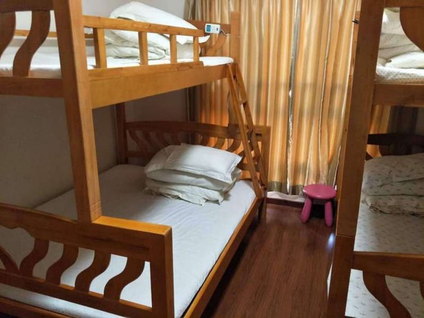 Imagen de la habitación del Hotel Yi Jia Ren Hostel. Foto 8