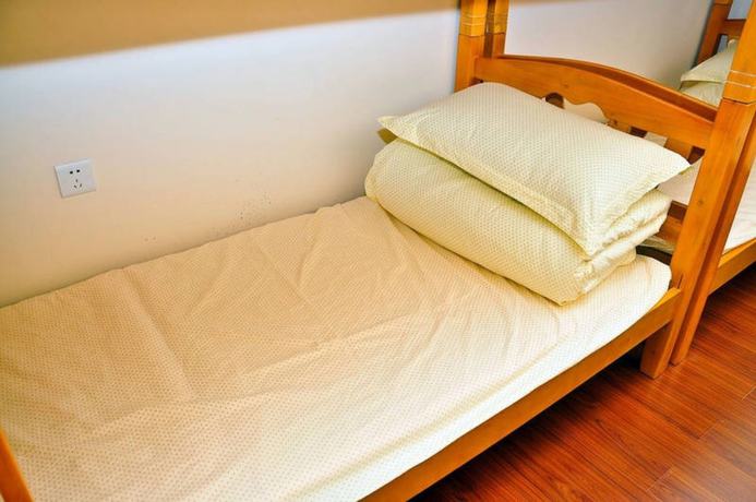 Imagen de la habitación del Hotel Yi Jia Ren Hostel. Foto 9