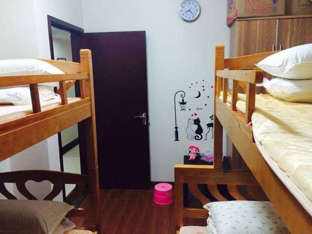 Imagen de la habitación del Hotel Yi Jia Ren Hostel. Foto 10