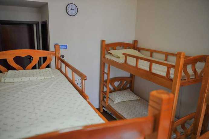 Imagen de la habitación del Hotel Yi Jia Ren Hostel. Foto 12