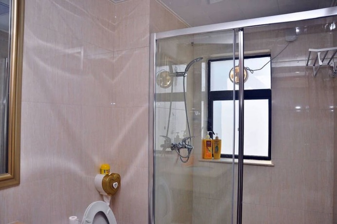 Imagen de la habitación del Hotel Yi Jia Ren Hostel. Foto 13