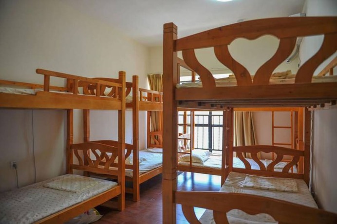 Imagen de la habitación del Hotel Yi Jia Ren Hostel. Foto 15