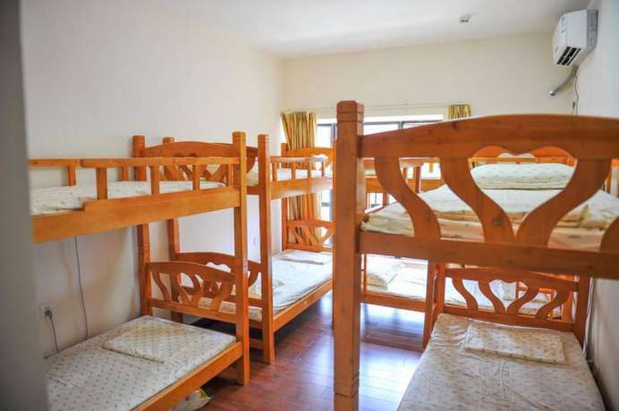 Imagen de la habitación del Hotel Yi Jia Ren Hostel. Foto 17