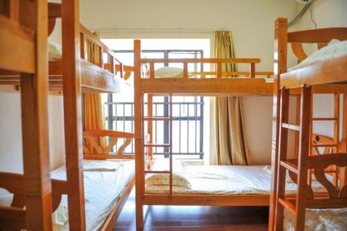 Imagen de la habitación del Hotel Yi Jia Ren Hostel. Foto 18