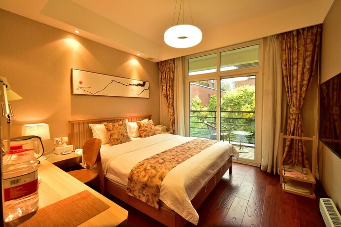 Imagen de la habitación del Hotel Yi Ming Shu Ju. Foto 18