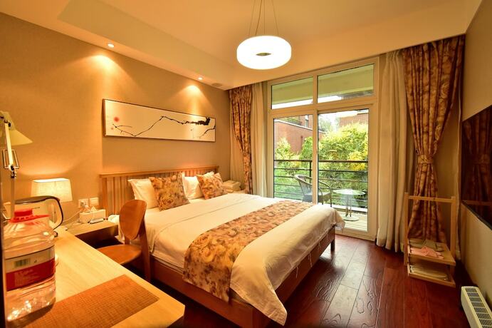 Imagen de la habitación del Hotel Yi Ming Shu Ju. Foto 28