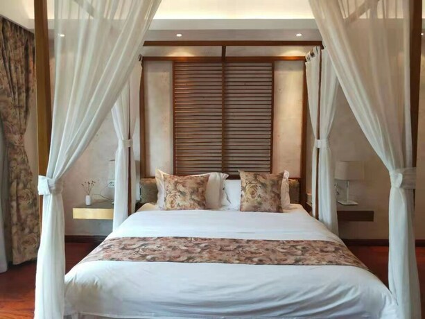 Imagen de la habitación del Hotel Yi Ming Shu Ju. Foto 31