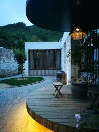 Imagen general del Hotel Yi She Mountain Inn. Foto 12