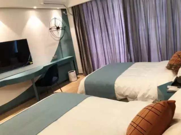 Imagen de la habitación del Hotel Yi Shu Jing Pin Holiday. Foto 2