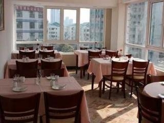 Imagen del bar/restaurante del Hotel Yi Ting Hotel Chain Shanghai Dongfang Road Shop. Foto 2