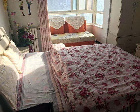 Imagen de la habitación del Hotel Yi Xin Apartment - Hostel. Foto 6