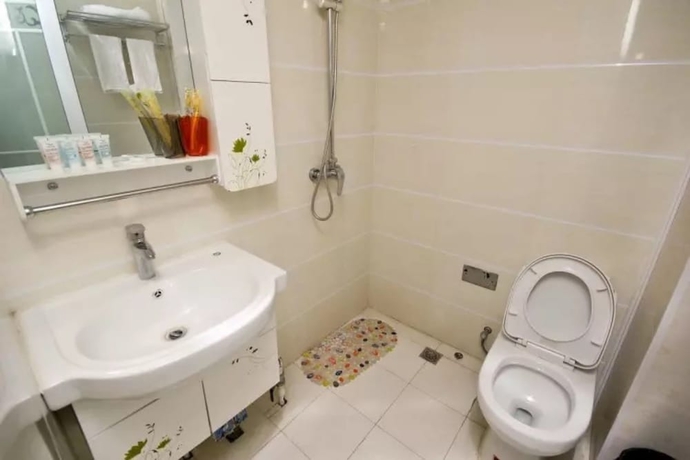 Imagen de la habitación del Hotel Yi Xin Apartment - Hostel. Foto 8