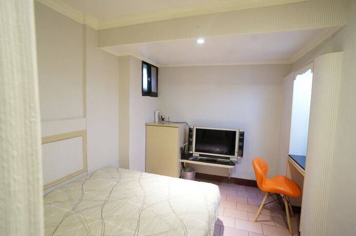 Imagen de la habitación del Hotel Yi Yuan. Foto 9