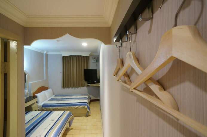 Imagen de la habitación del Hotel Yi Yuan. Foto 10