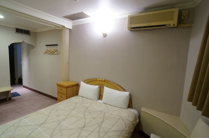 Imagen de la habitación del Hotel Yi Yuan. Foto 11