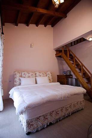 Imagen de la habitación del Hotel Yi-He Golden Homestay. Foto 4