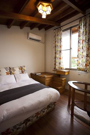 Imagen de la habitación del Hotel Yi-He Golden Homestay. Foto 6