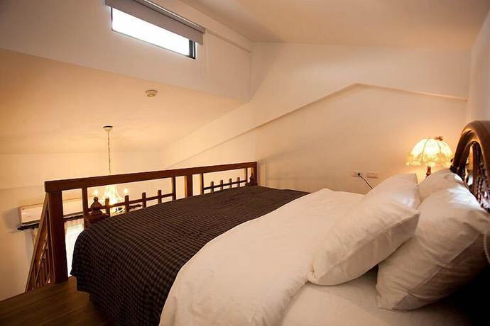 Imagen de la habitación del Hotel Yi-He Golden Homestay. Foto 7