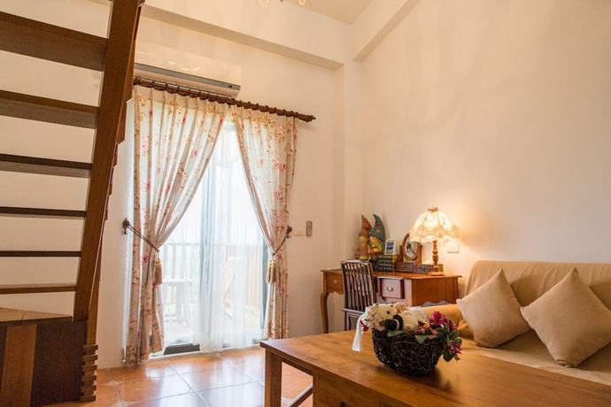 Imagen de la habitación del Hotel Yi-He Golden Homestay. Foto 11