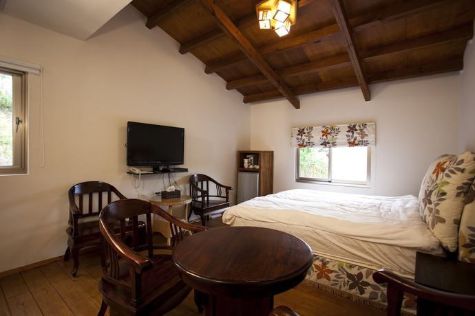 Imagen de la habitación del Hotel Yi-He Golden Homestay. Foto 14