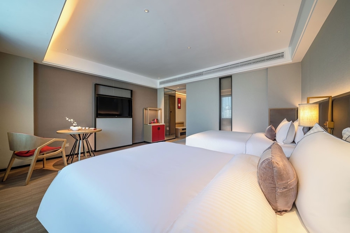 Imagen general del Hotel Yicheng Wuzhou City Government. Foto 1