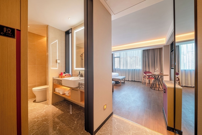 Imagen de la habitación del Hotel Yicheng Wuzhou City Government. Foto 2