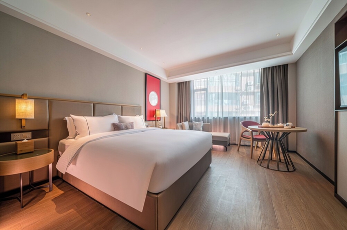 Imagen de la habitación del Hotel Yicheng Wuzhou City Government. Foto 4