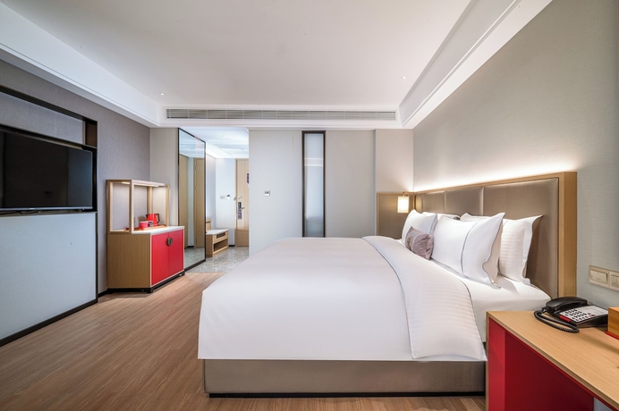 Imagen de la habitación del Hotel Yicheng Wuzhou City Government. Foto 8