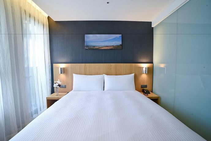 Imagen de la habitación del Hotel Yidear. Foto 11