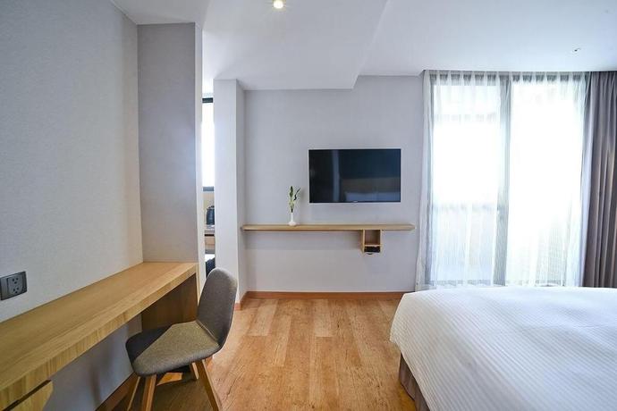 Imagen de la habitación del Hotel Yidear. Foto 17