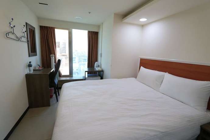 Imagen de la habitación del Hotel Yidianyuan Hotel. Foto 3