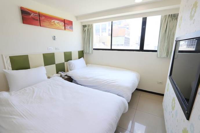 Imagen de la habitación del Hotel Yidianyuan Hotel. Foto 6