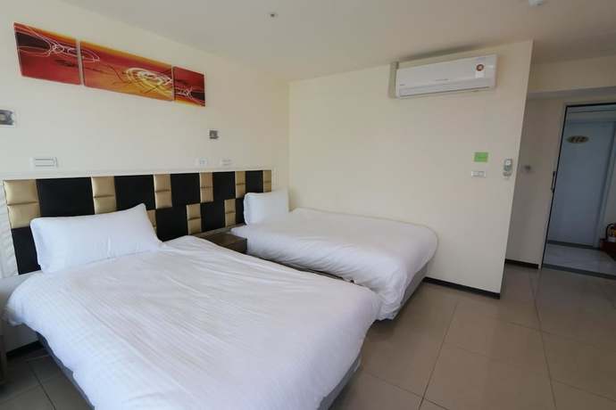 Imagen de la habitación del Hotel Yidianyuan Hotel. Foto 8
