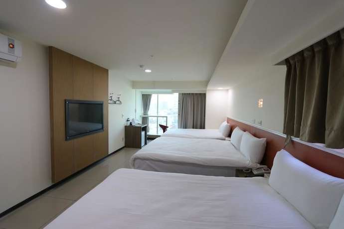 Imagen de la habitación del Hotel Yidianyuan Hotel. Foto 11