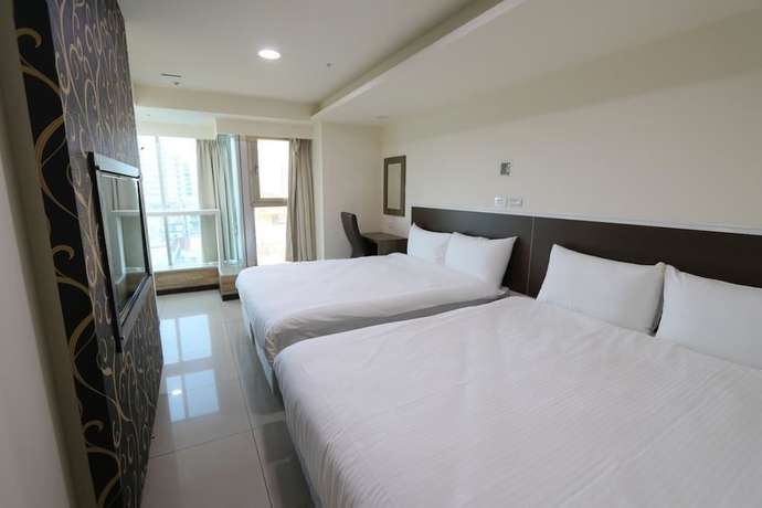Imagen de la habitación del Hotel Yidianyuan Hotel. Foto 12