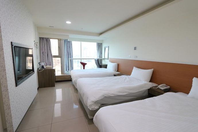 Imagen de la habitación del Hotel Yidianyuan Hotel. Foto 13